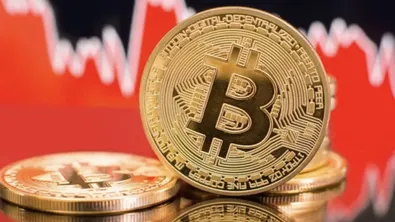 Биткойнът пада под $60 000: Инвеститорите се отдръпват от рискови активи